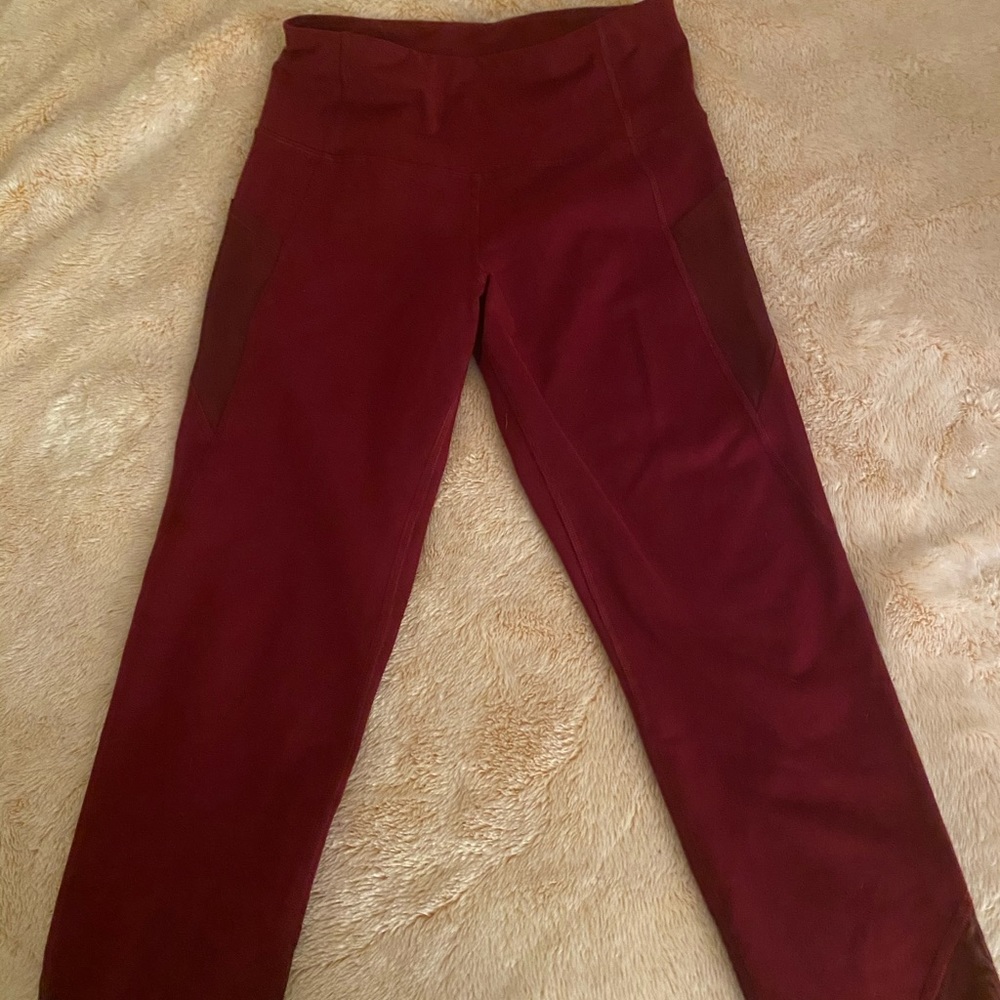 Burgundy color leggings with mesh detail